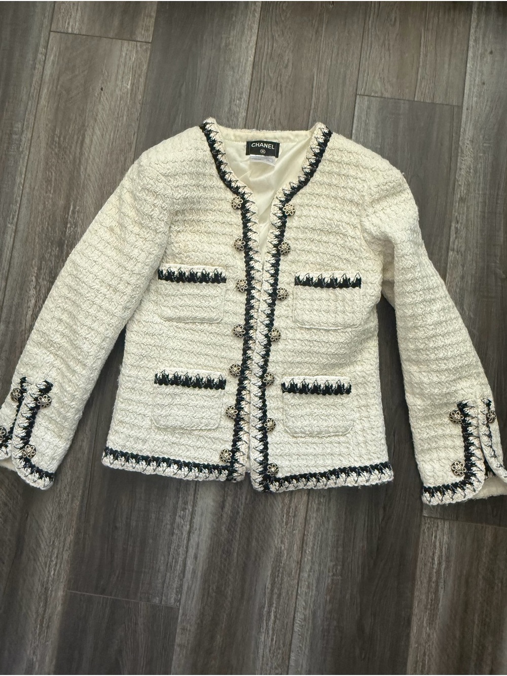 CHANEL Women's Cream Bouclé Tweed Jacket with Black Trim